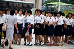 North Korean high school students in rows of two on their way to the library
