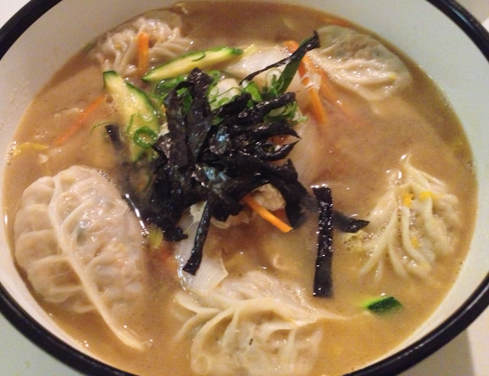Mandoo Soup: Korean vegetable dumplings in broth, topped with seaweed