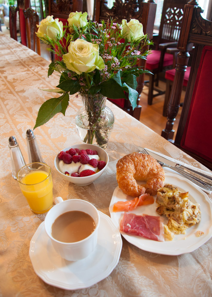 A B&B breakfast as it should be: raspberries in yogurt, egg au gratin, prosciutto, smoked salmon, croissant, fresh orange juice and coffee latte. With love, in Seattle.