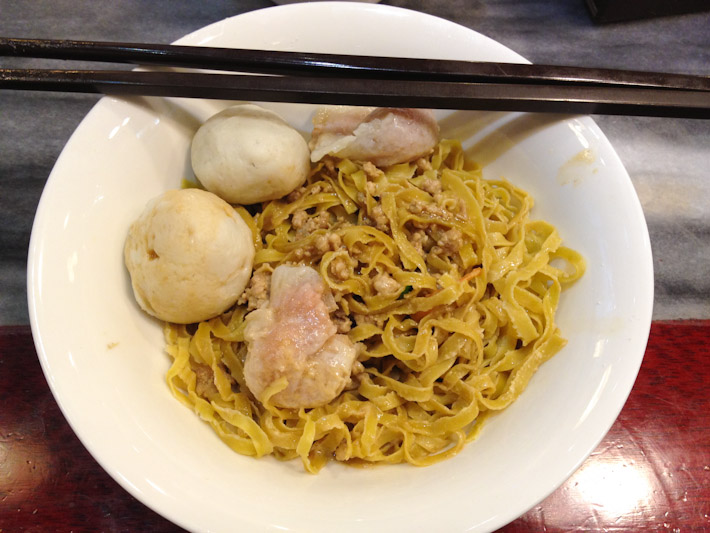 Vinegary egg noodles with pork dumplings and fish balls: probably an acquired state, but you've gotta start somewhere..