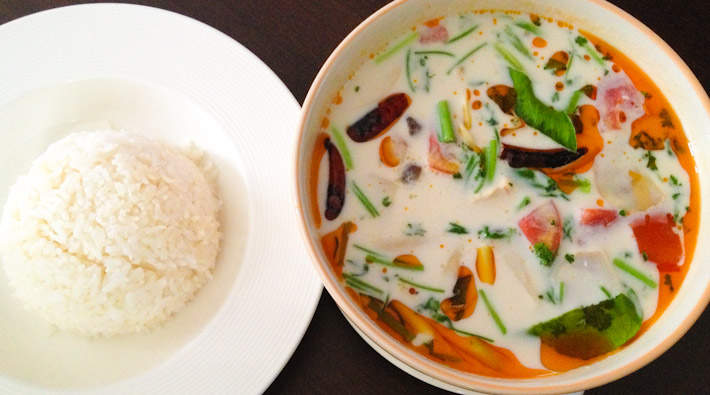 Tom Kha Goong: curry-like soup with chicken, galanga root and coconut. 