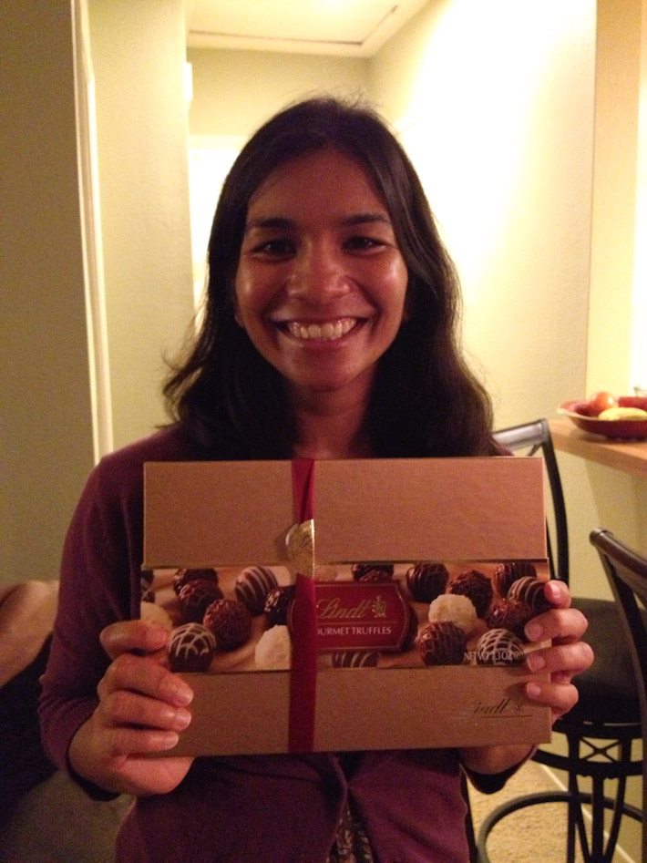 Sakshi enjoying some chocolate truffles we brought as thank-you gift