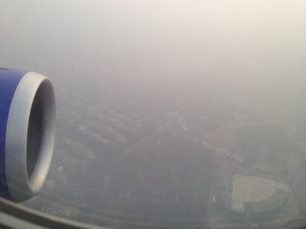 About to land in smog covered New Delhi (Dec. 2013)