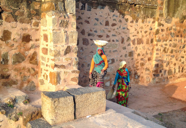 Ladies working on the restoration of Hauz Khas ruins