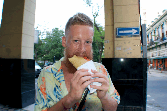Jules of Don’t Forget To Move enjoying street food in Cuba