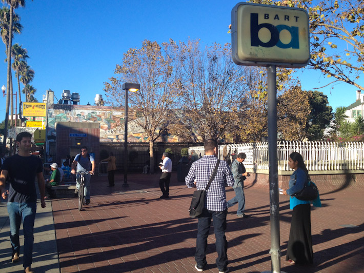 Outside The Mission BART Station. On Sundays, it is common for man with microphones to be preaching Catholic values in Spanish around here.
