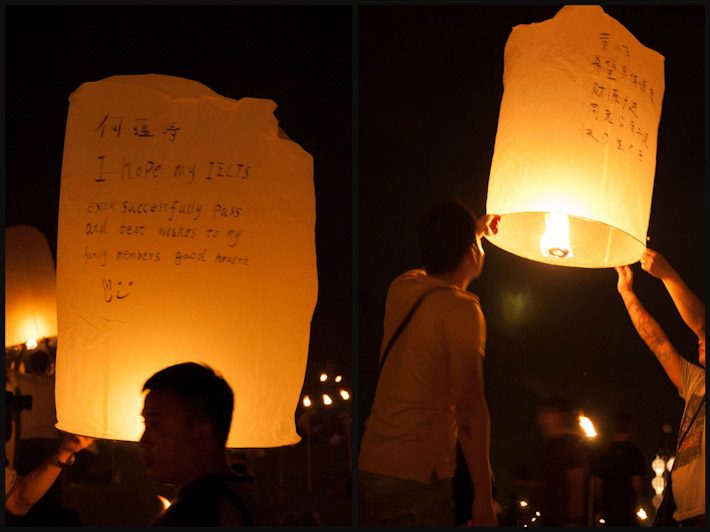 People write their messages and wishes on their lanterns