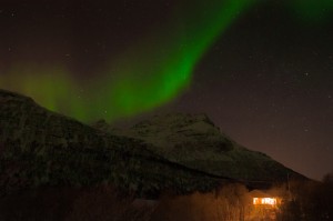 Northern Lights over a Cozy Cottage