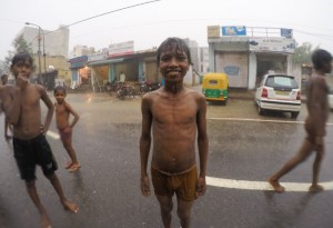 Kids playing in the rain in Delhi