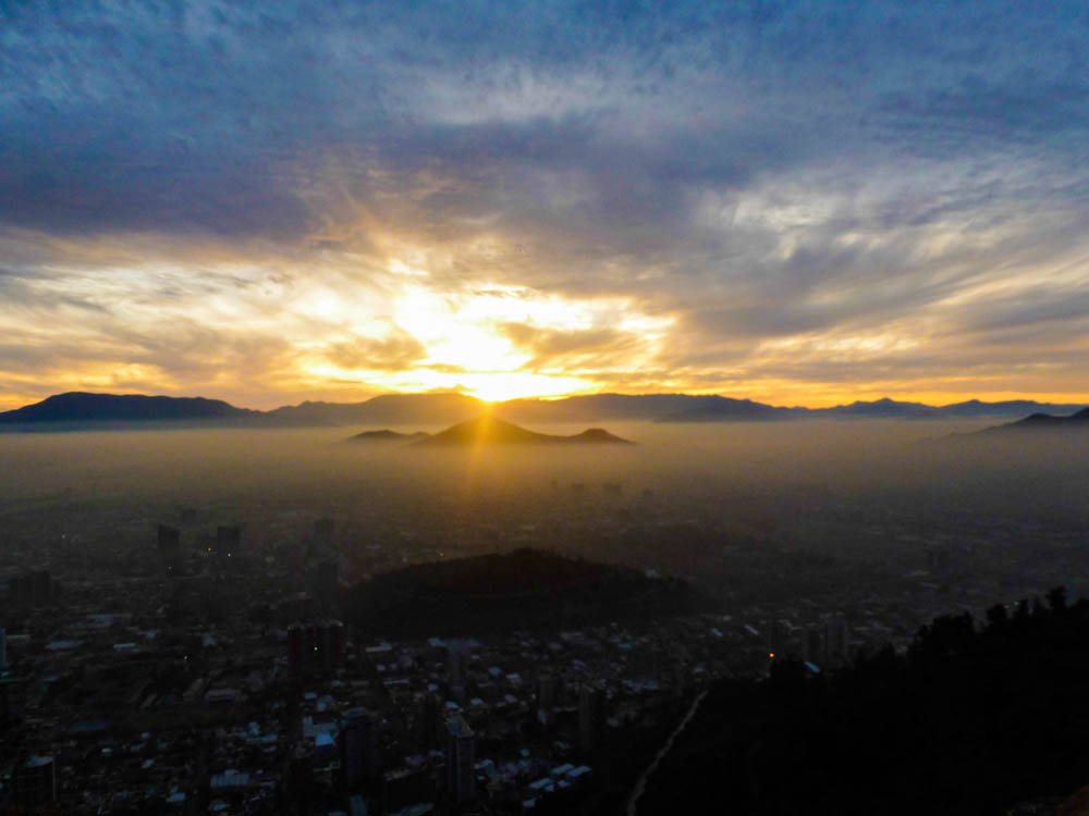 The winter sun setting over Santiago