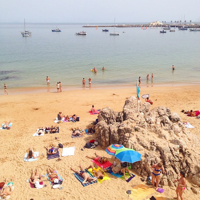 Lounging at the beach in Cascais, Portugal