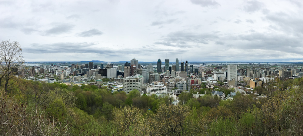 The skyline of Montreal as seen from the top of Mount Royal on a cloudy day