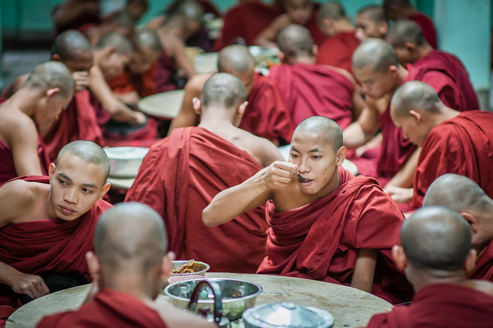 Buddhist monks’ lunch ceremony at Kha Khat Wain Kyaung monastery in Bago