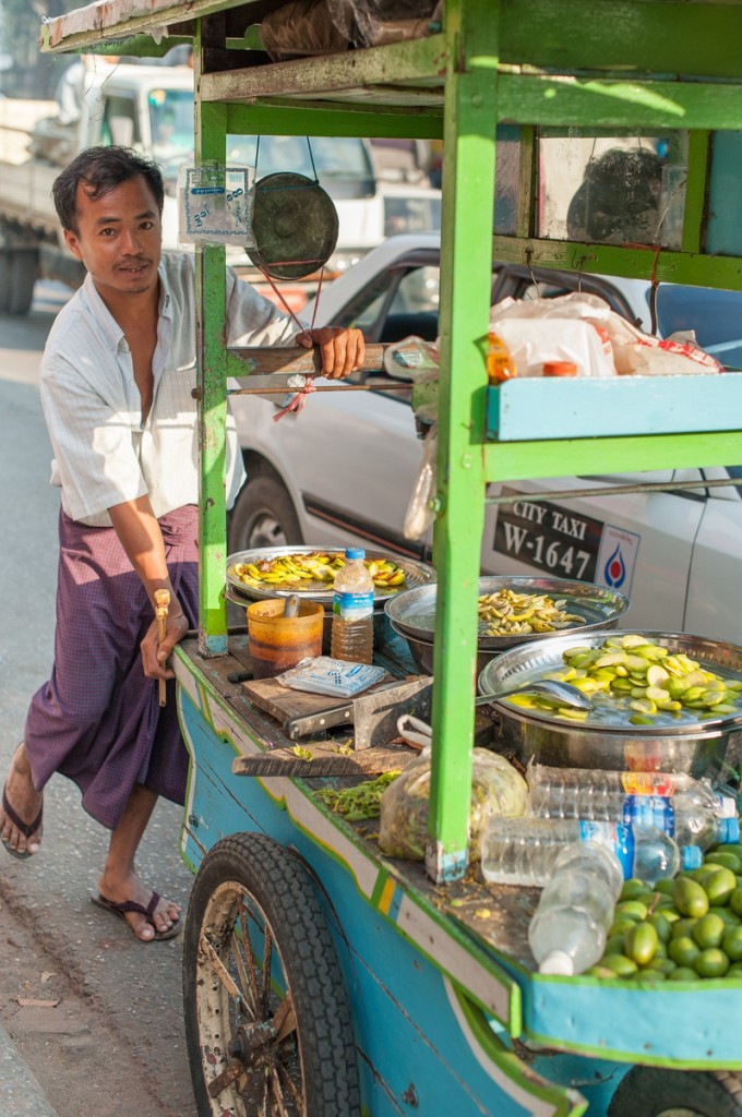 Man wearing a longyi in the streets of Yangon