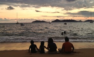 Sunset over Acapulco with kids