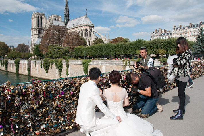 Wedding photos at the Love Lock Bridge in Paris