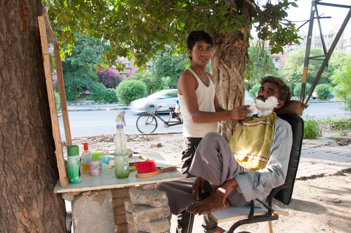 Street barbershop in India