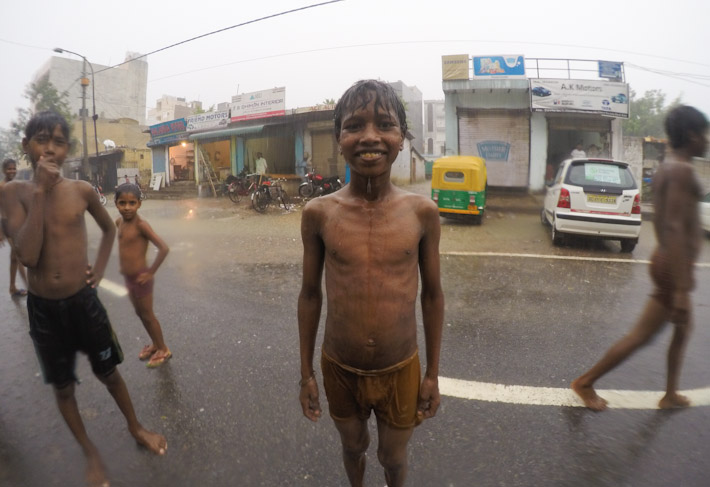 Kids playing in the rain in Delhi