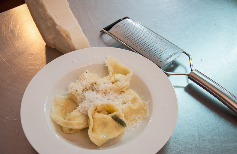 Tortelloni lightly boiled and sauteed with butter sage... and, as always, a touch of freshly shaved Parmigiano Reggiano on top!